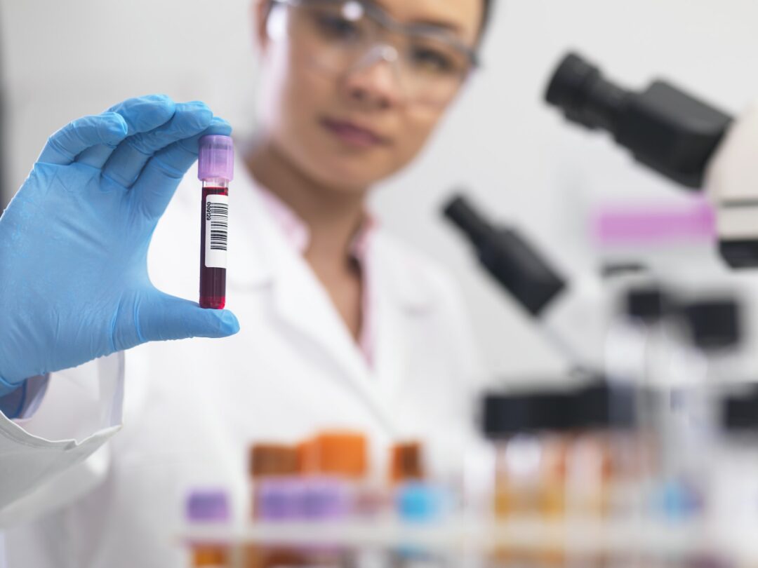 Scientist preparing clinical samples for medical testing in a laboratory